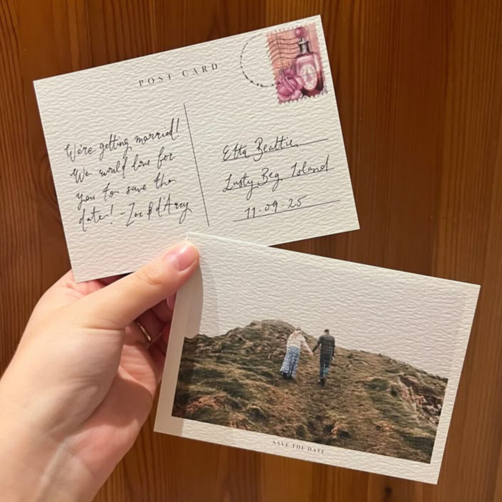Postcard wedding save the date with one side having couple image and the other side with the wedding details
