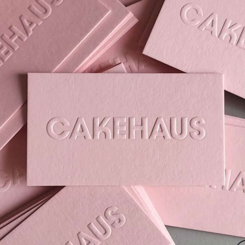 De bossed pink business cards