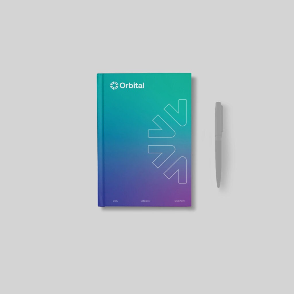 ombre green, blue and purple hard back book with simple text.